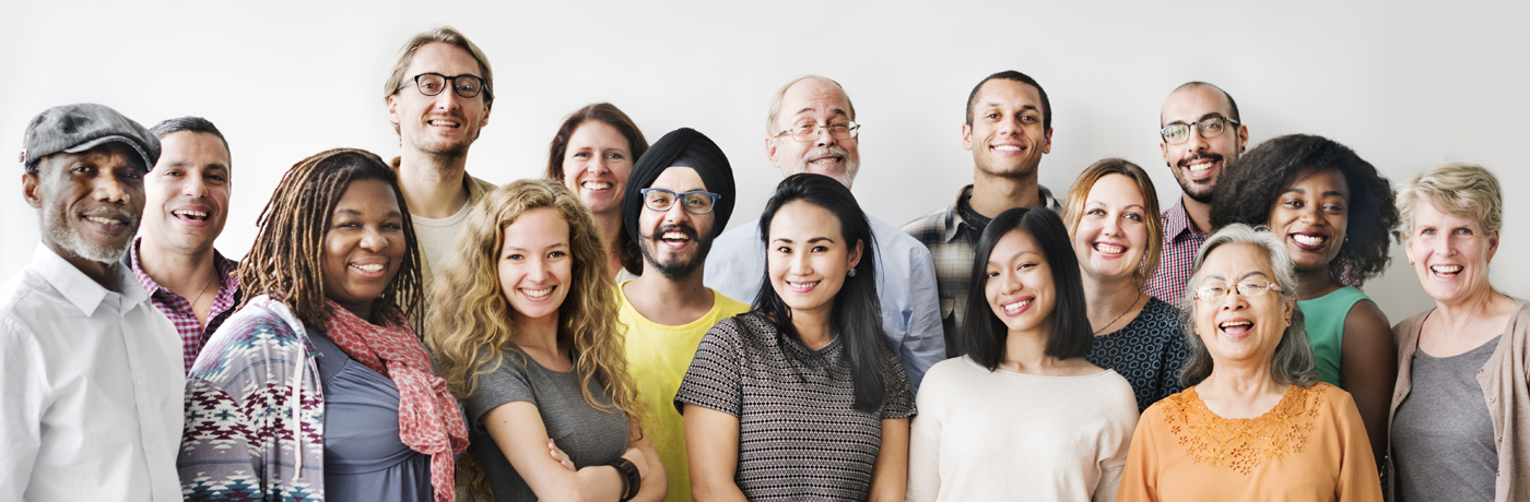 Ethnically diverse crowd standing together